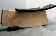 A CURVILINEAR APPROACH TO THE RECEPTION DESK OF THE WALLPAPER HOTEL